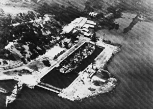 The German ship Warenfels lies scuttled in the port of Diego Suarez