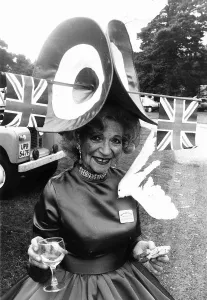00180 Prints: Gertrude Shilling in Union Jack flag hat at Royal Ascot in 1982