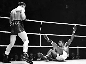 00048 Prints: Gibbs hits the canvas. After Johnny Pritchett had connected with a right in the 3rd round