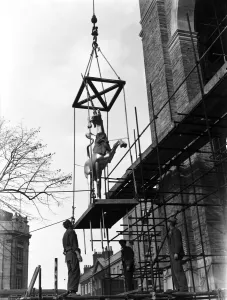 Sculpture Prints: One of the gilded unicorns seen here being hoisted up on to the roof of Bristol City Hall