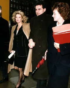 Gillian Taylforth actress arriving at court with Geoffrey Knights where she was sueing