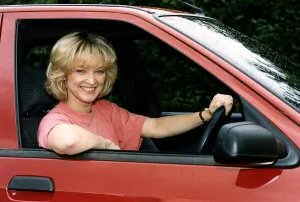 Gillian Taylforth actress Kathy in BBC television soap opera Eastenders in Citroen diesel
