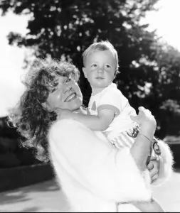 Gilly Coman star in the BBC TV Series Bread carrying her little son