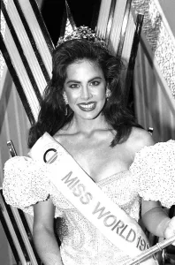 Gina Tolleson of the United States celebrates after being named Miss World 1990 following