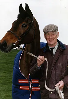 Ginger McCain holds the 26 year old race horse by the reins Circa January 1992