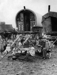 Caravans Prints: Gipsies Camps. A soldier plays with the children of a Gypsy Campon returning from