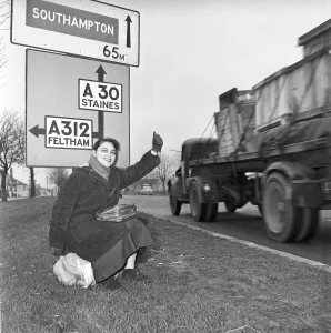 Girl hitch-hiking on the A30. to Southampton Circa 1957
