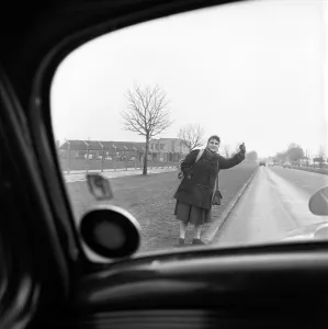 Girl hitch-hiking on the A30. to Southampton Circa 1957