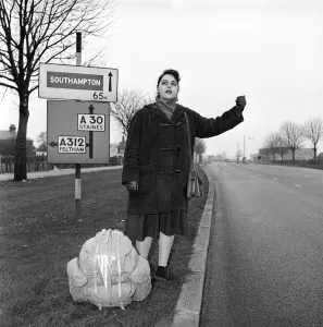 Girl hitch-hiking on the A30. to Southampton Circa 1957