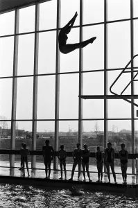 Silhouette Prints: A girl jumping off a diving board at a new swimming pool in Basildon, Essex