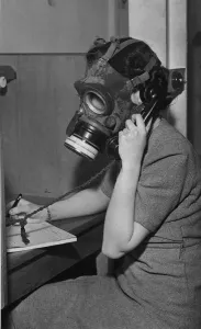 One Woman Only Prints: A girl telephonist at the main A. R. P. control centre of Liverpool operating her phone