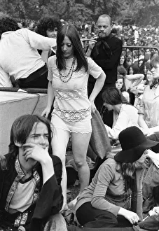 A girl wearing a see through dress as she enjoys the all day concert at Hyde Park