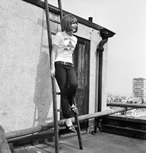 Girl wearing the latest teenage fashion fad - a Radio Caroline sweater - is Christine