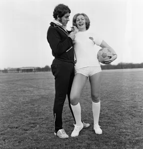 01499 Prints: Girls from Anne Scott Model Agency play football against a team from Sweetheart Plastics