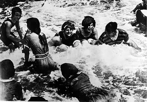 Outdoor Leisure Prints: Girls in bathing costumes, braving the elements and the controversy, at the coast in 1913