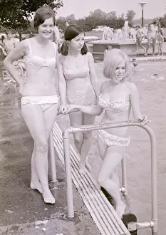 Girls in bikinis enjoying the hot summer at Ryton open-air swimming pool, Coventry