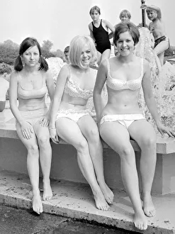 Girls in bikinis enjoying the hot summer at Ryton open-air swimming pool, Coventry