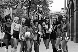 01509 Prints: Eleven girls this morning lined-up dressed in the colours of their favourite football