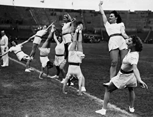 Exercise Prints: Girls of the National Fire Service (NFS) undergo physical training during a PT display