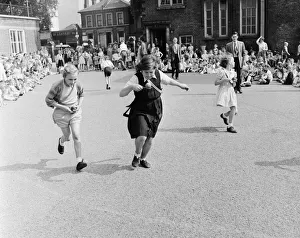 Girls of Oliver Goldsmith Junior School in Peckham London take part in the egg