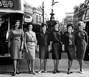 00283 Prints: Six girls wearing the latest Marks and Spencer clothes pose at Piccadilly Circus in