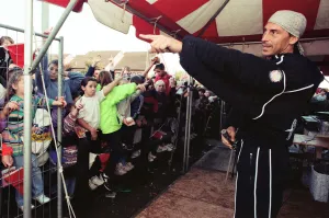 Gladiators Prints: Gladiator Wolf (Michael Van Wijk) entertains the crowds of children
