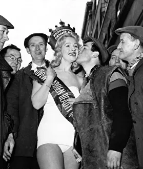 Market Prints: Glamour - Beauty Queens 1958. Miss Mediterranean Orange seen here being kissed by one of