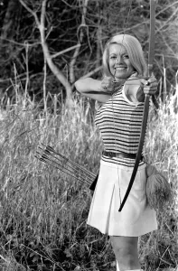 Archer Prints: Glamour model Lyn Mason seen here getting her eye in with her bow and arrow