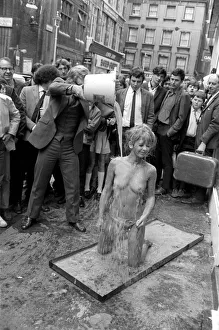 Glamour: Unusual: Helen Jones lies in tray of cement (Carol)