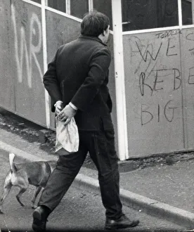 01126 Prints: Glasgow Gangs July 1968 marching to the arms dump a youth carring a brown paper bag