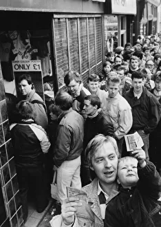 Scene Prints: Glasgow Rangers fans queue for tickets for the Old Firm clash with Celtic
