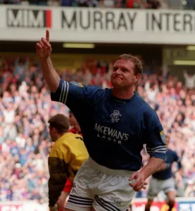 Glasgow Rangers footballer Paul Gascoigne celebrates after scoring one of his three goals