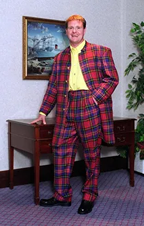 Glasgow Rangers footballer Paul Gascoigne dressed in a tartan suit. 14th June 1996