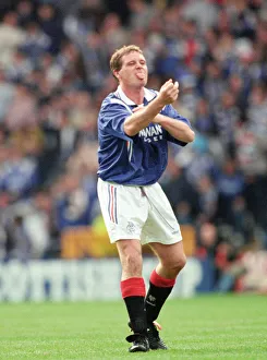 Scotland Prints: Glasgow Rangers footballer Paul Gascoigne making a one finger gesture while sticking out