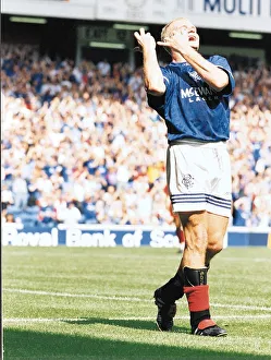 Glasgow Rangers footballer Paul Gascoigne pretending to play the lute during a pre season
