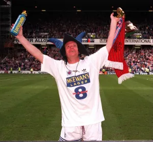 One Person Only Prints: Glasgow Rangers footballer Paul Gascoigne wearing a jesters hat