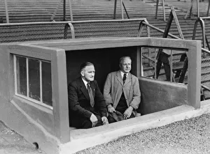 Glasgow Rangers trainer Joe Craven (left) in the Rangers Doug-out with a member of staff