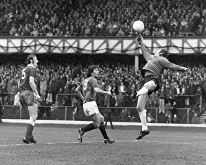 Diving Prints: Glasgow Rangers v. Aberdeen. Dons keeper Andy Ceohegan makes a one handed save