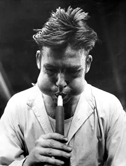 Glass blower Albert Coulson puffs and blows his way through another job in September 1972