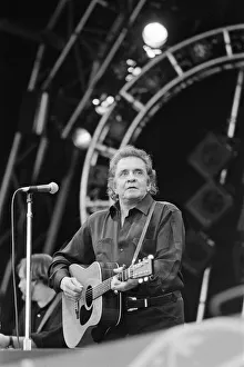 01233 Prints: Glastonbury Festival 1994. Pictures shows Johnny Cash performing on The Pyramid