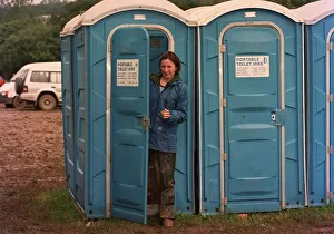 Glastonbury Festival 1997 with Mirror reporter Lucy Rock coming out of a portaloo