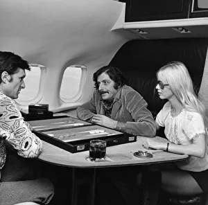 Magazine Prints: The gleaming black Playboy jet leaves Londons Heathrow airport for Chicago