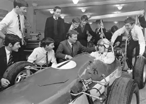 Warwick Prints: A gleaming red racing car ready to be wheeled out of the workshops at Aylesford High