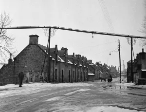 Winter Prints: Glen Grant Distillery Rothes. The steel pipe crossing over the road carries whisky