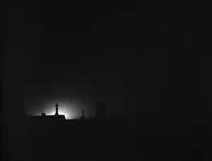 Silhouette Prints: The glow from fires started by the bombing of the East End and docks light up London