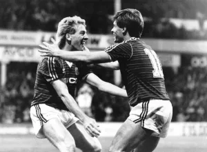 00254 Prints: Goal. Frank McAvennie gets congratulations from team-mate Tony Cottee after scoring