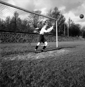 00222 Prints: Goalkeeper David Hole dives to try and save the ball going into the goal January