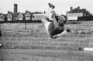 Dramatic Prints: Goalkeeper Bill Glazier of Crystal Palace FC in mid flight diving for the ball during a