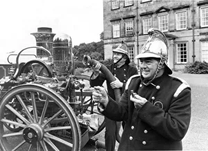 Firefighter Prints: Goeff and Robin dressed as Victorian Firefighters with a fire engine of that era