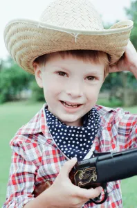 00846 Prints: Golcar Nursery school children pictured during a Wild West fund day and barbecue